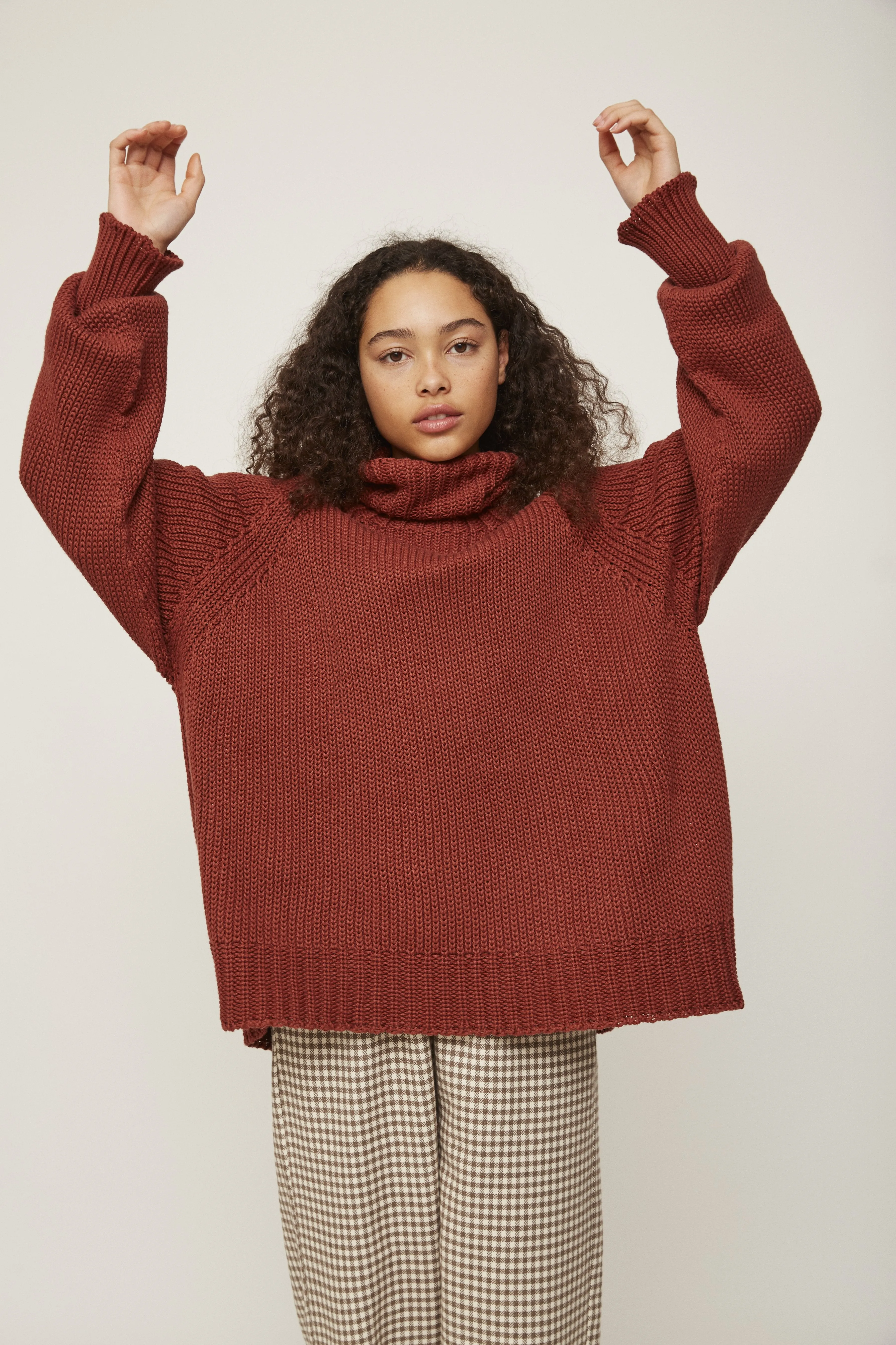 oversized high-neck rust knitwear