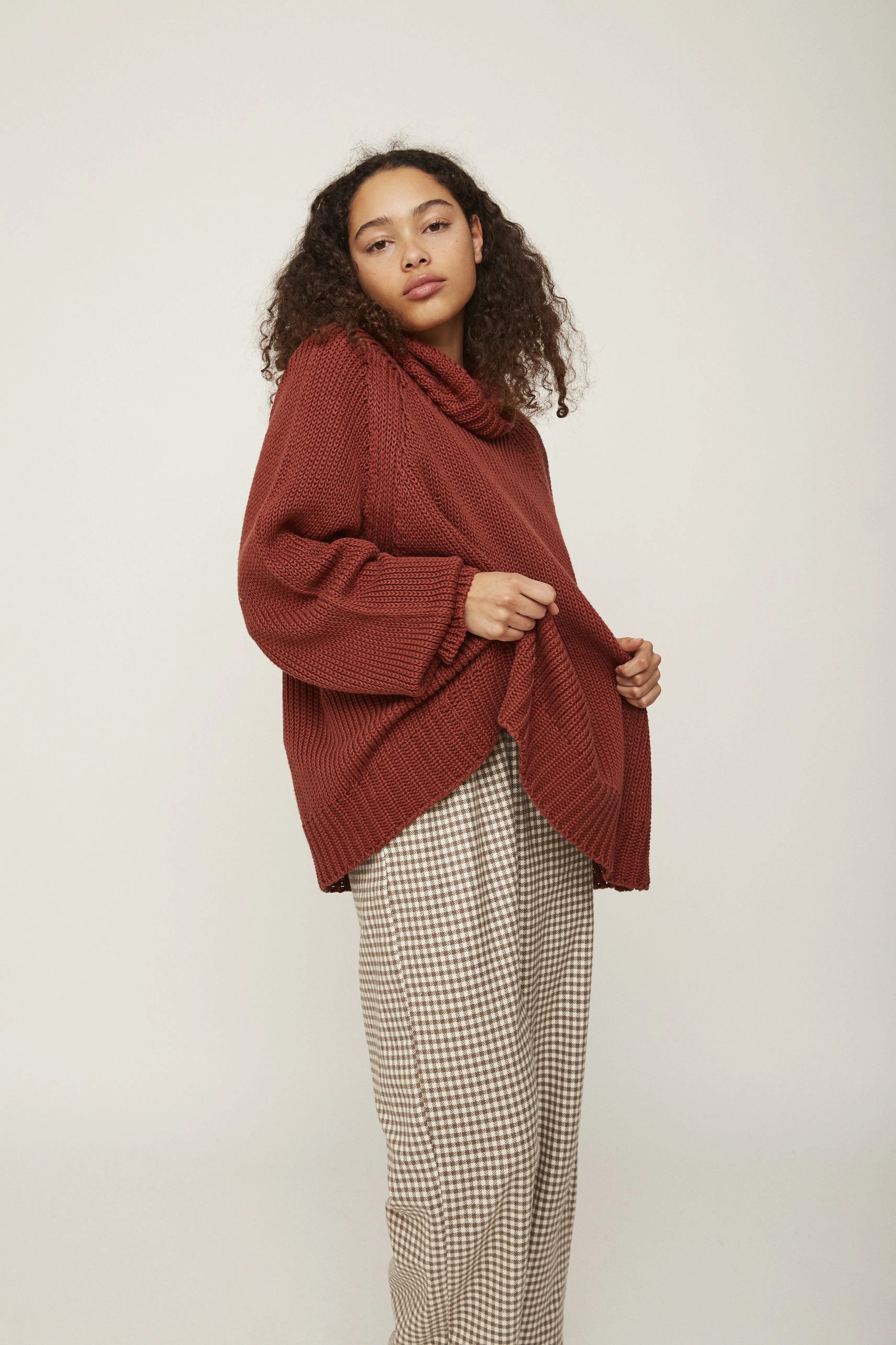 oversized high-neck rust knitwear