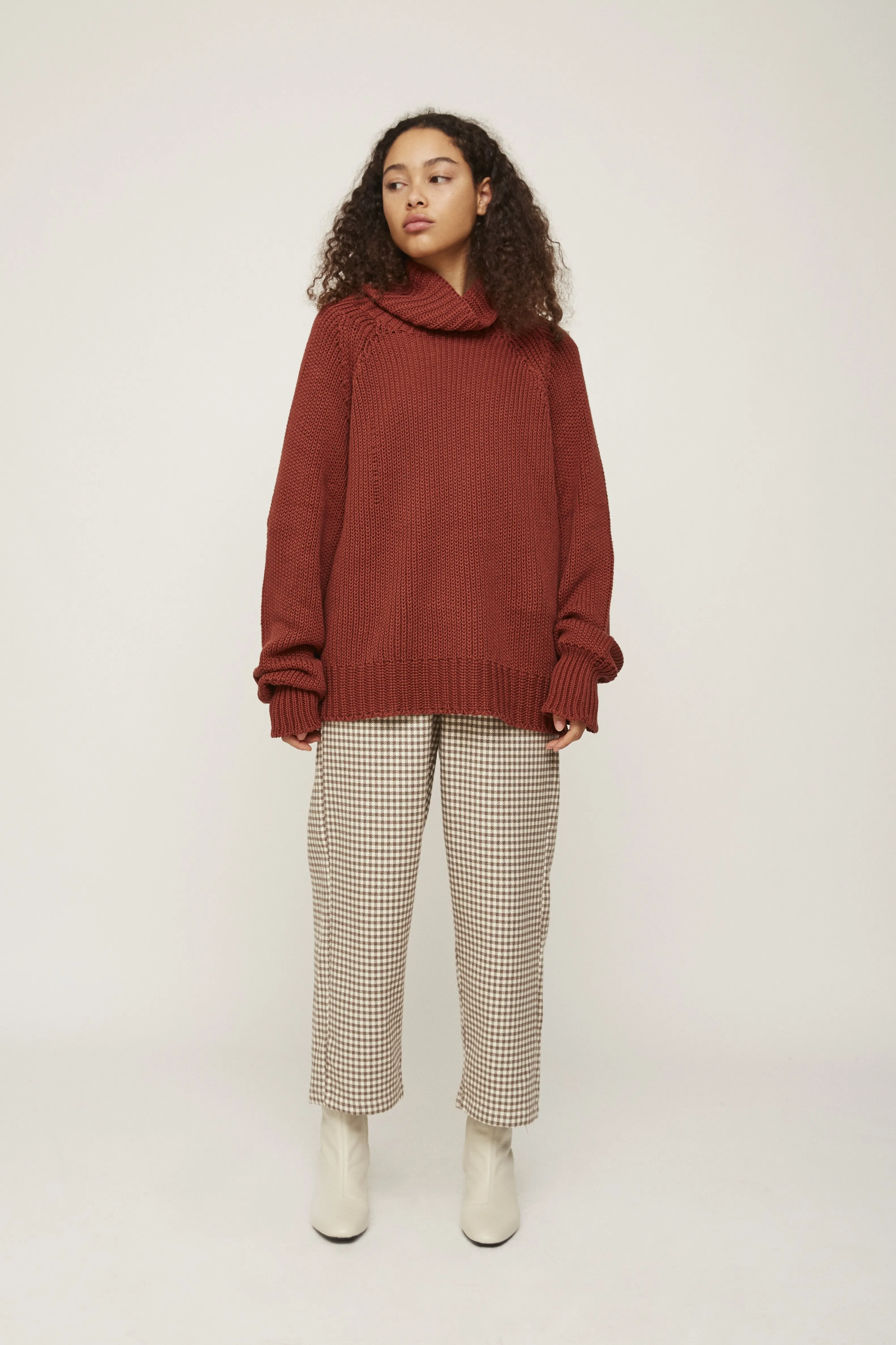 oversized high-neck rust knitwear